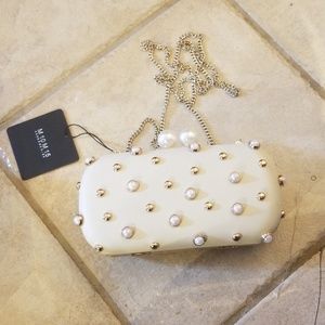 Ivory clutch with pearls